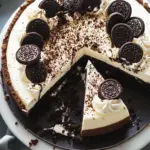 Oreo Cheesecake with Chocolate Ganache & Whipped Cream